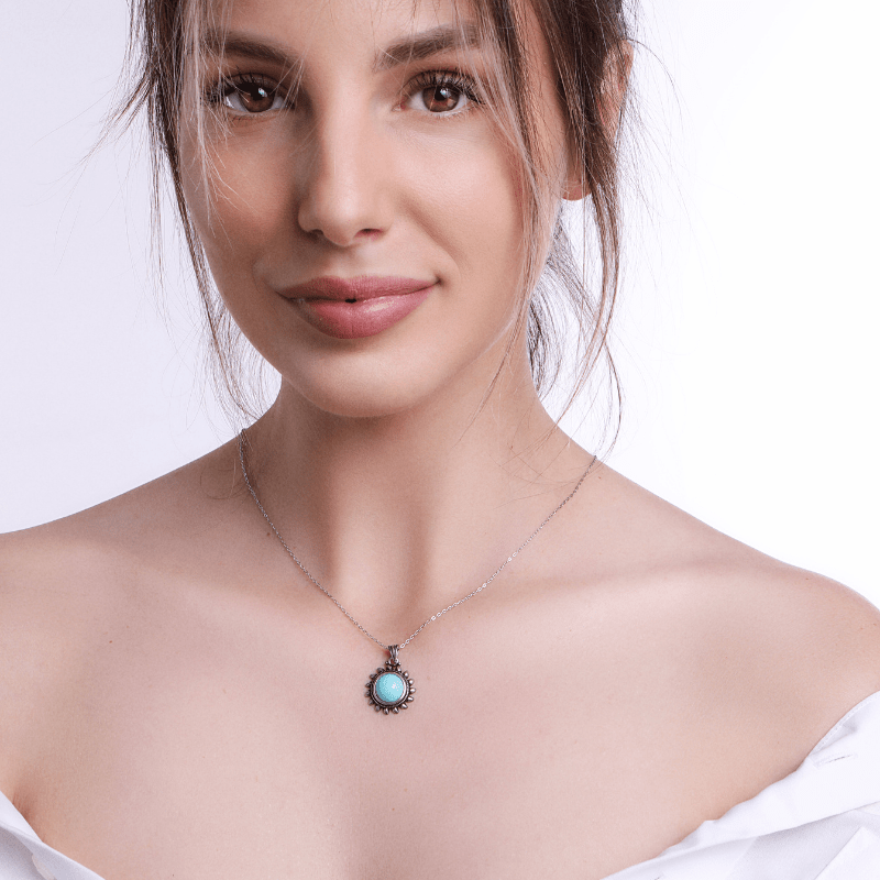 HERA - TURKOOOIZEN ZON GELUKSHANGER KETTING