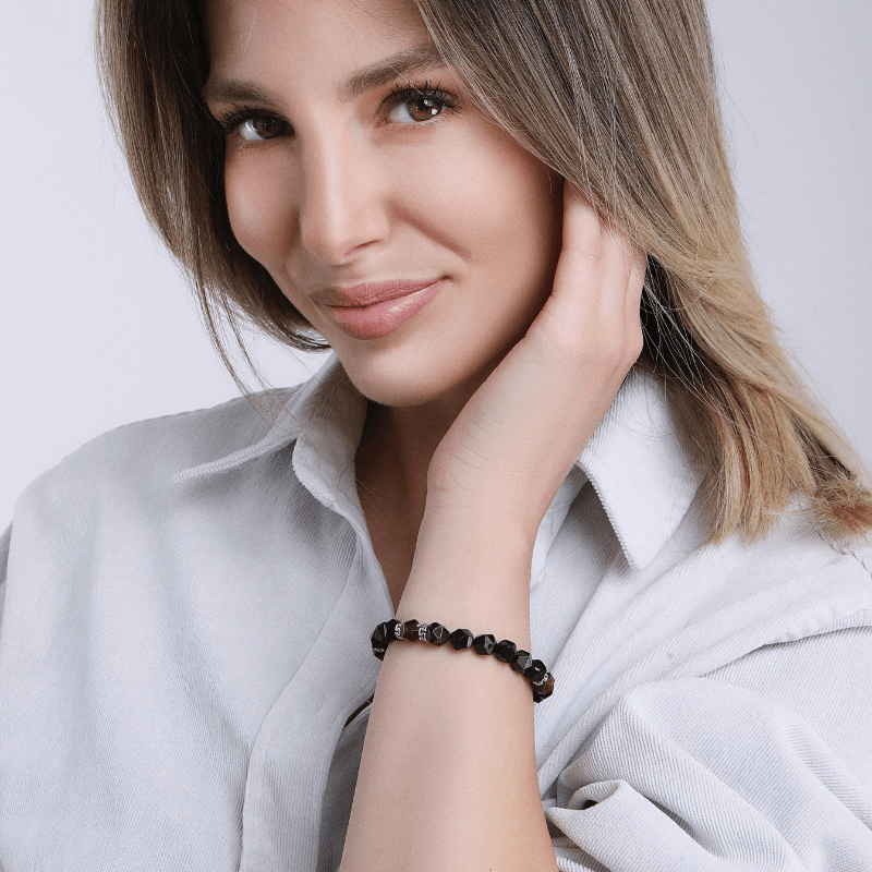 ONWRIKBARE KRACHT ZWARTE AGAAT & TIJGEROOG ARMBAND