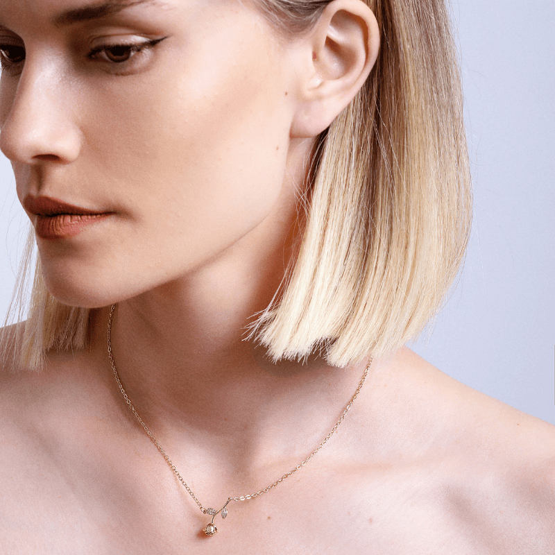 FONKELENDE ROOS HANGER KETTING