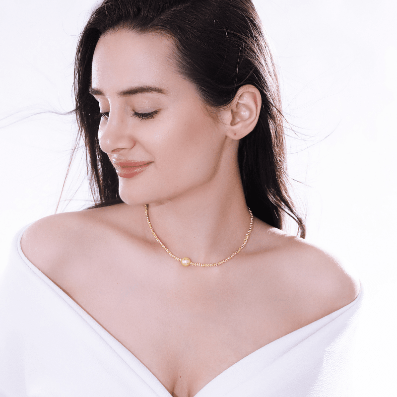 GEWOONWEG PRACHTIGE GESTRUCTUREERDE GOUDEN PARELKETTING