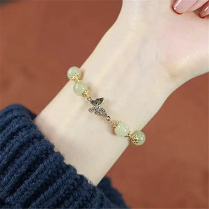 CHARISMATISCHE VLINDER JADE GOUDEN ARMBAND