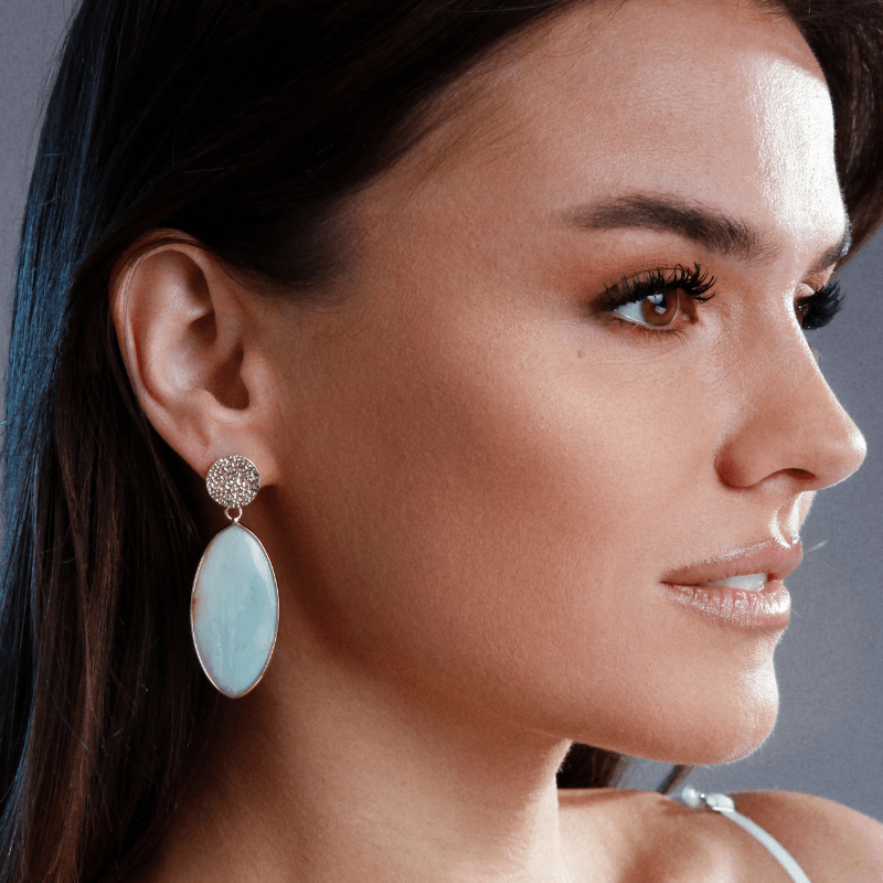 WINTERSE GENADE AMAZONIET BLAD OORBELLEN