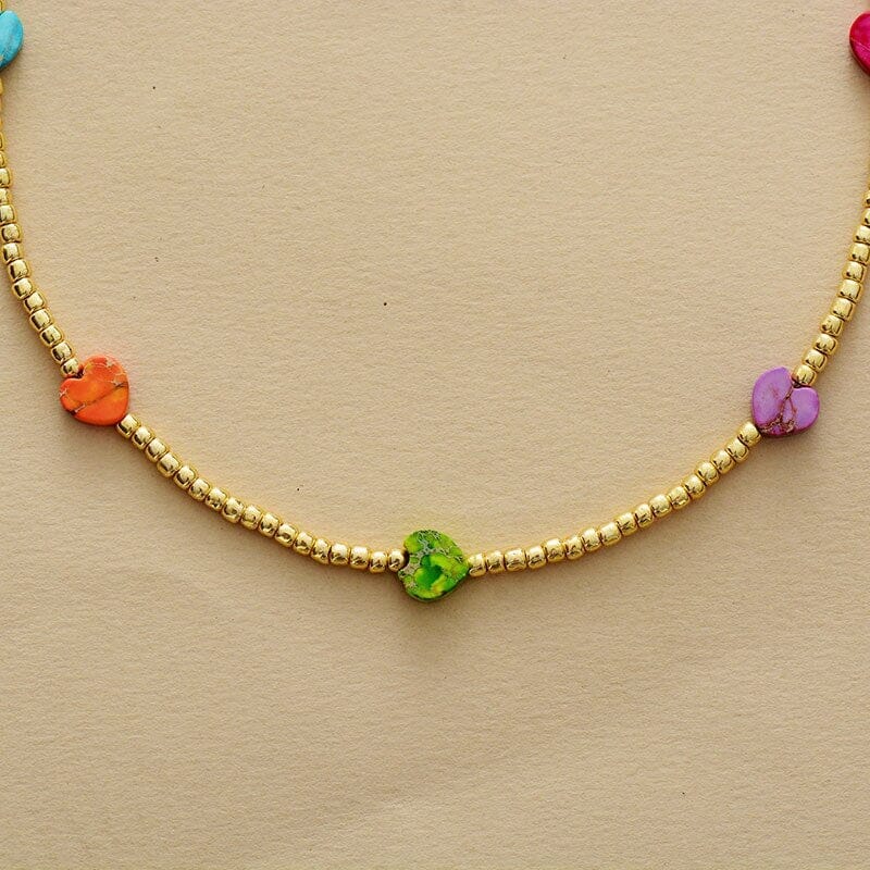 GOUDEN HARTKETTING MET 7 CHAKRA'S