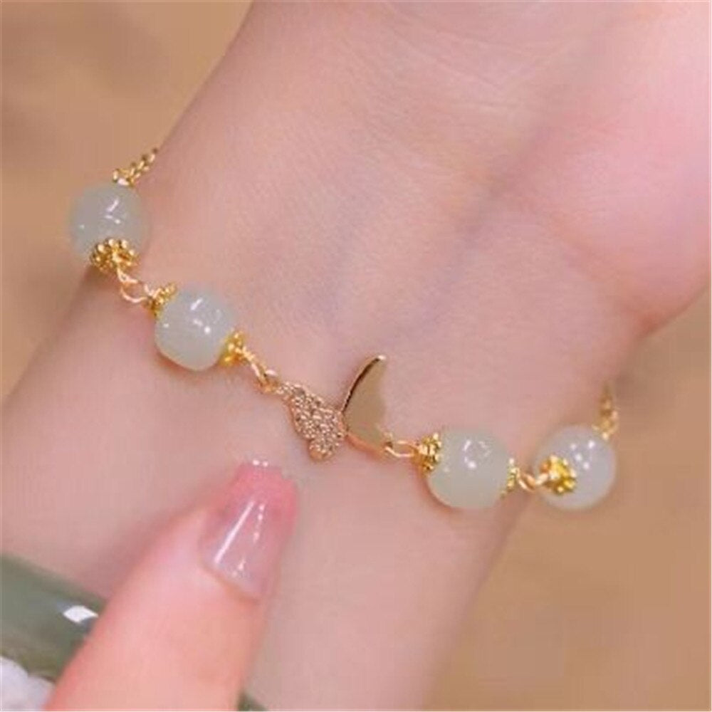 CHARISMATISCHE VLINDER JADE GOUDEN ARMBAND