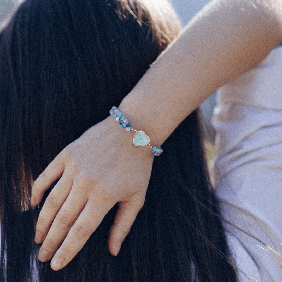 HART VAN DE OCEAAN GEVLOCHTEN OPAAL ARMBAND