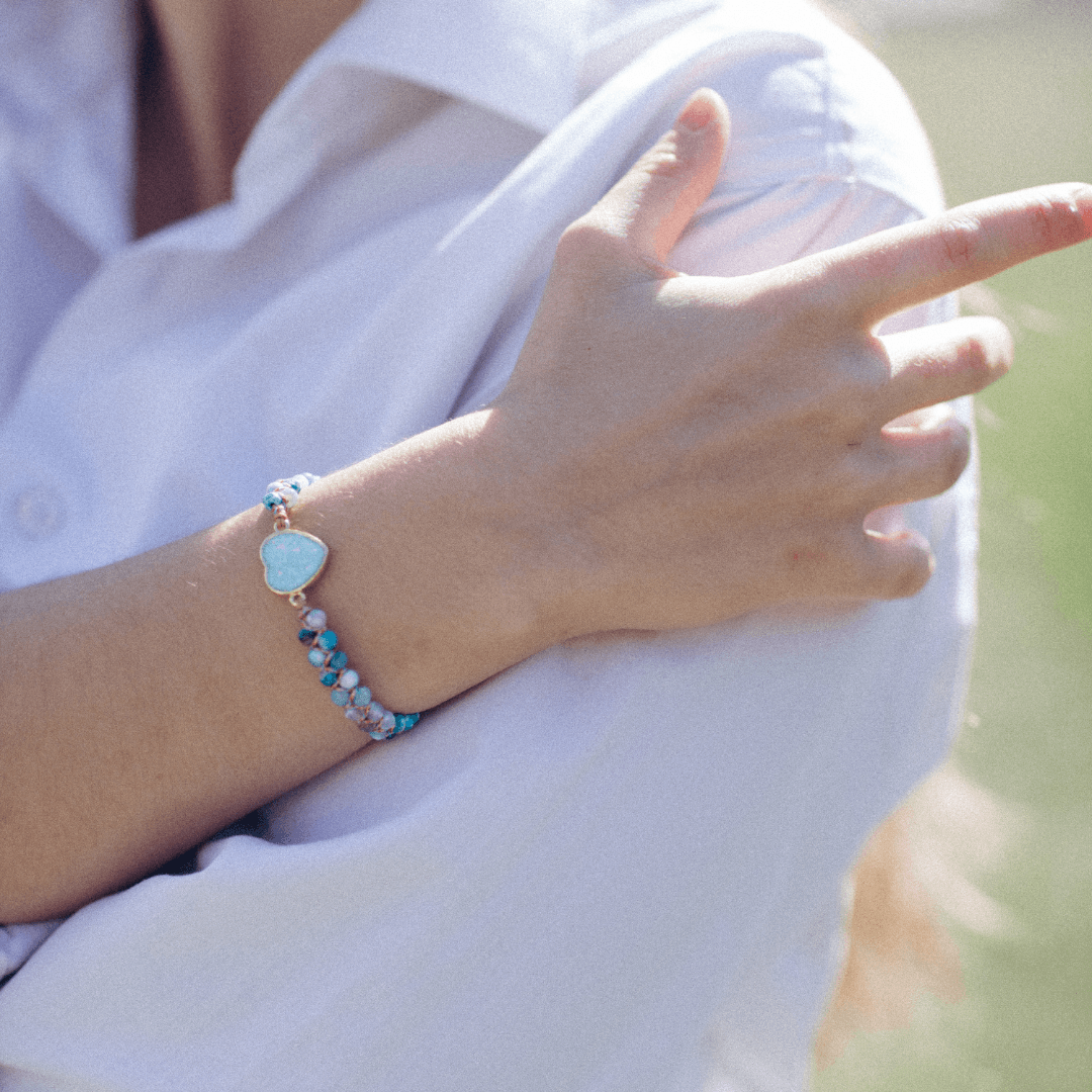 HART VAN DE OCEAAN GEVLOCHTEN OPAAL ARMBAND