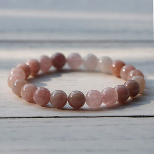 ZIELVOLLE COMPASSIE ROZE SNEEUWVLOK TOERMALIJN ARMBAND