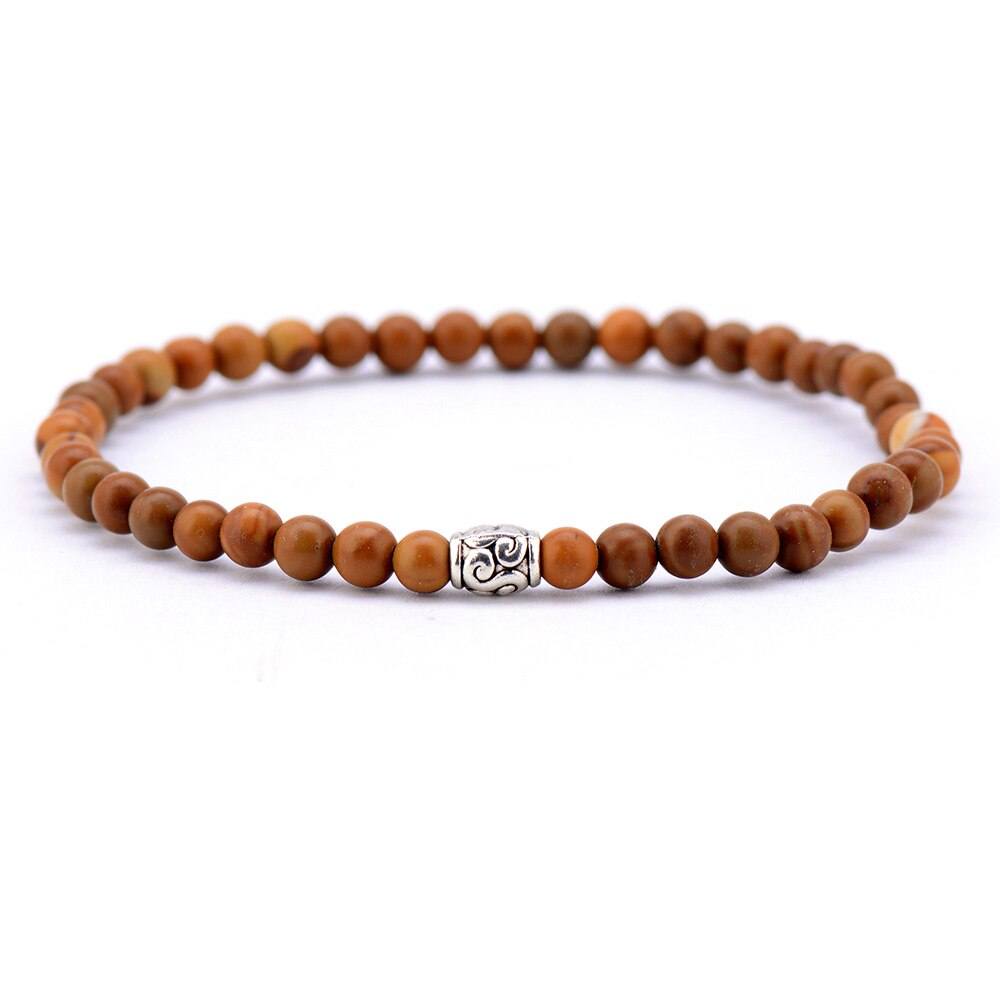 OVERVLOEDIGE ZEGENINGEN HOUTEN TIBETAANSE KRALEN ARMBAND