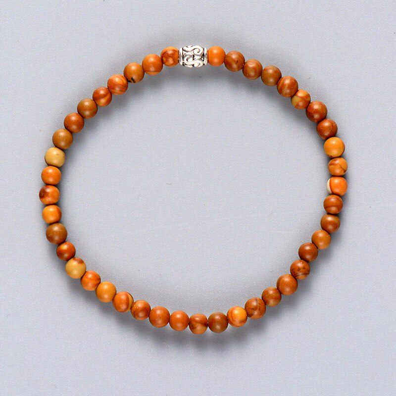 OVERVLOEDIGE ZEGENINGEN HOUTEN TIBETAANSE KRALEN ARMBAND