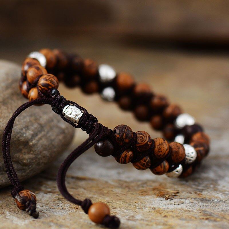 ZIELSVOEDENDE TIBETAANSE KRALEN ARMBAND