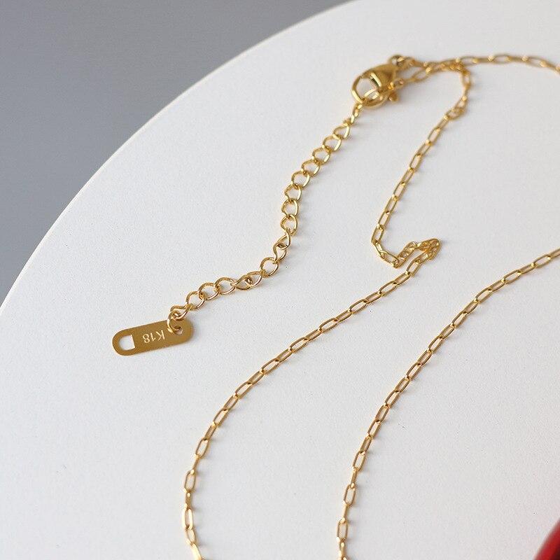 YIN & YANG ZWART/WIT OPAAL HANGER COLLIER