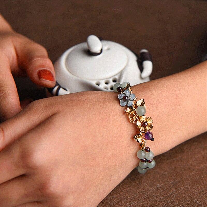 DELICATE SCHELP BLOEM JADE GOUDEN ARMBAND