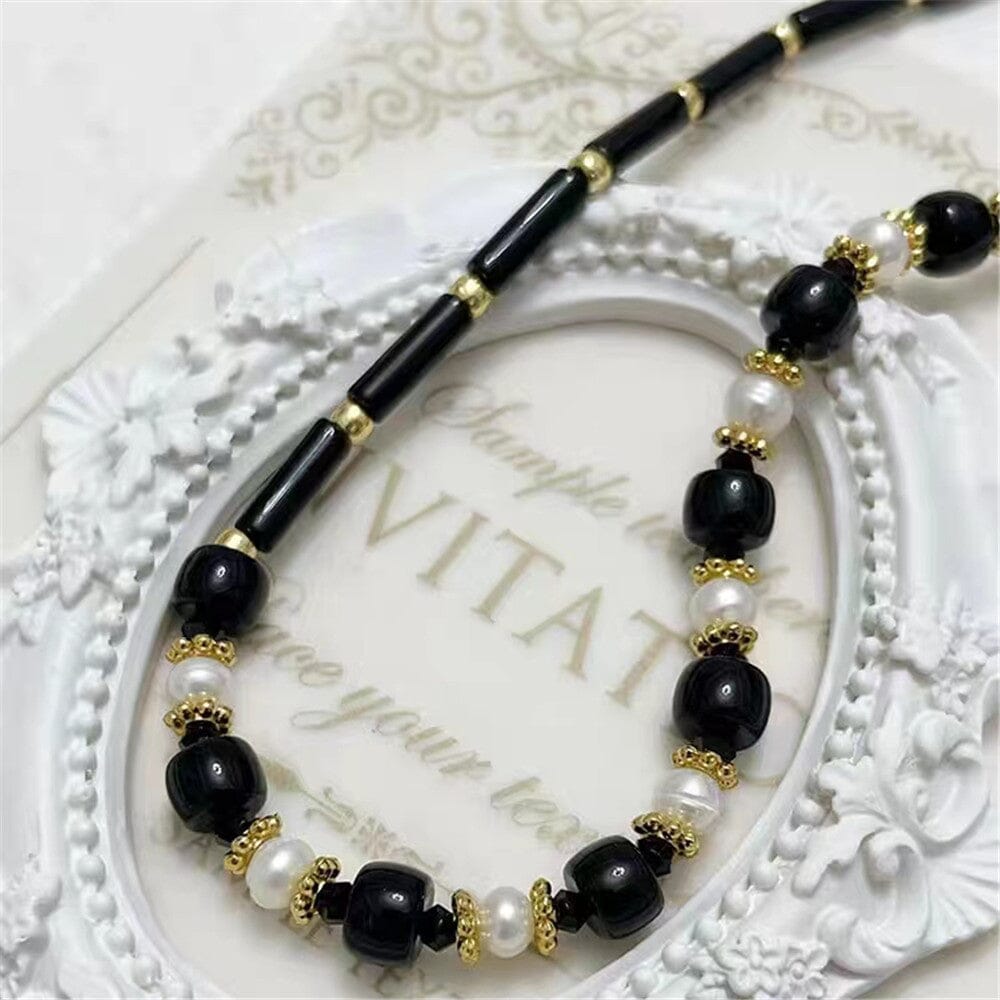 TIJDLOZE PARELKETTING