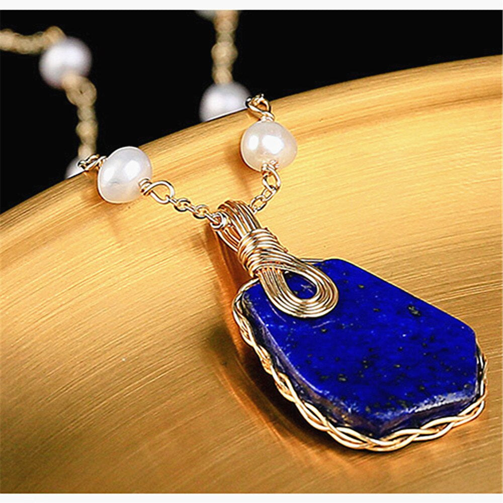 OCEAANBODEM LAPIS LAZULI & PAREL VERGULDE HANGER