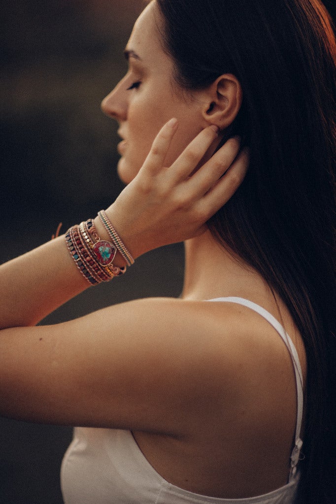 OVERVLOEDIGE LIEFDES WIKKELARMBAND