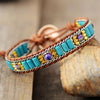 TURQUOISE ZON ARMBAND