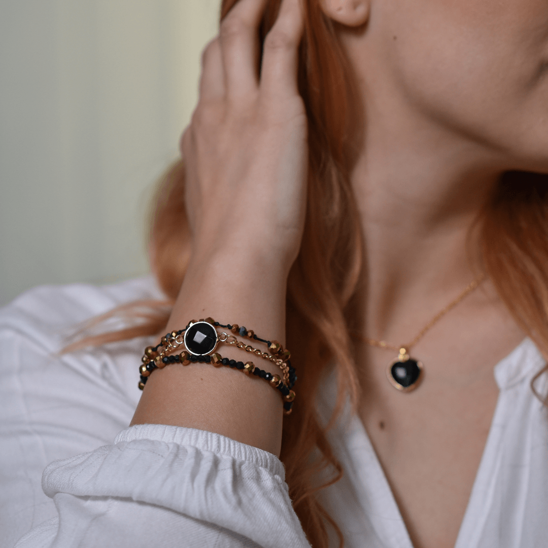 POSITIEVE AURA ZWARTE ONYX VERGULDE KRALEN ARMBAND