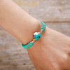 SIERLIJKE BEDELS TURQUOISE MALA ARMBAND