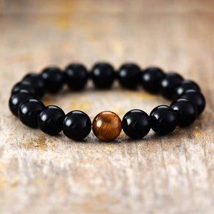 MOEDIGE KRACHT ZWARTE ONYX TIJGEROOG ARMBAND