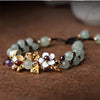 DELICATE SCHELP BLOEM JADE GOUDEN ARMBAND