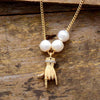 GOUDEN BOEDDHA HAND PAREL KETTING