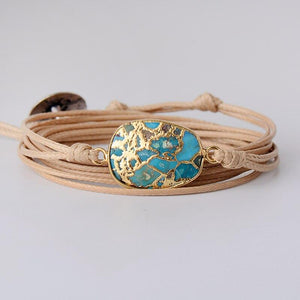GOUD GEADERDE TURKOOIS ARMBAND