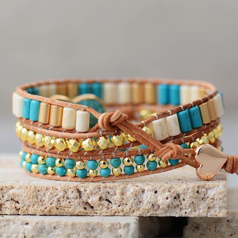 GOUDEN KRUIS TURQUOISE WIKKELARMBAND