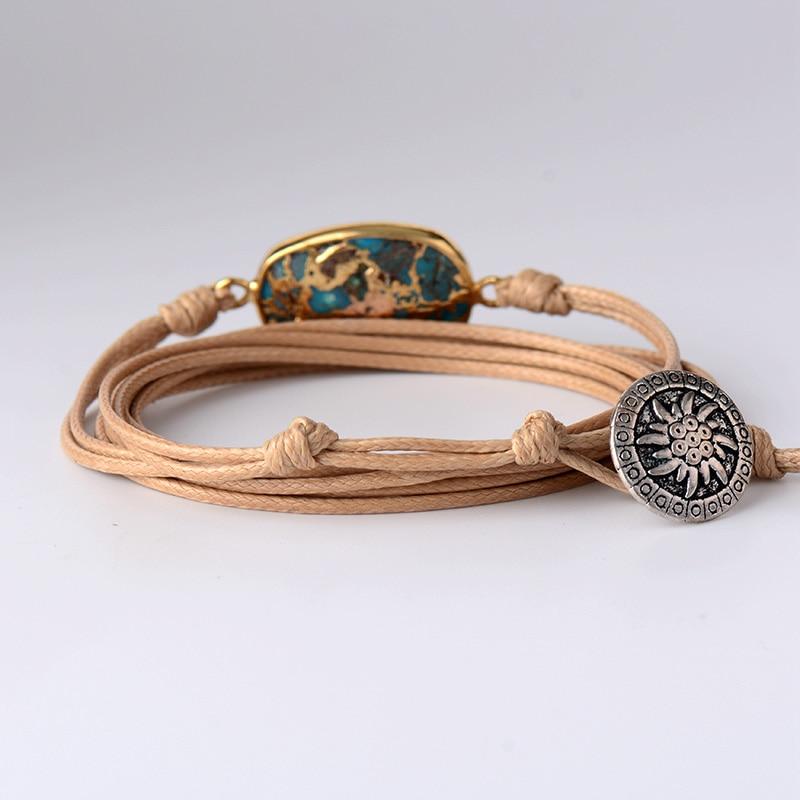 GOUD GEADERDE TURKOOIS ARMBAND