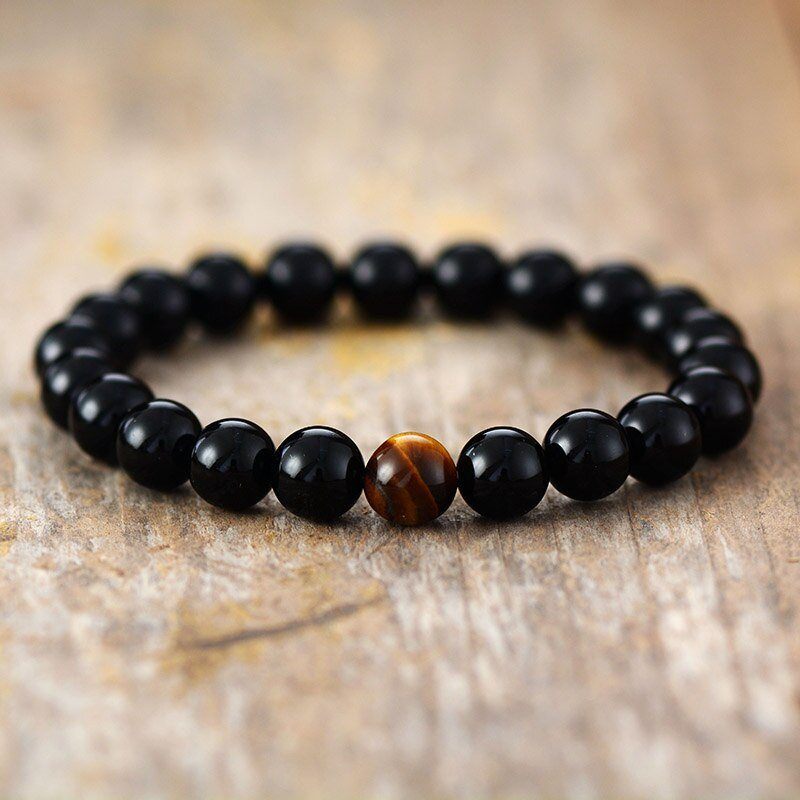 MOEDIGE KRACHT ZWARTE ONYX TIJGEROOG ARMBAND