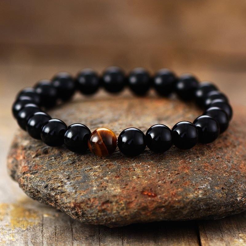 MOEDIGE KRACHT ZWARTE ONYX TIJGEROOG ARMBAND