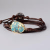 GOUD GEADERDE TURKOOIS ARMBAND