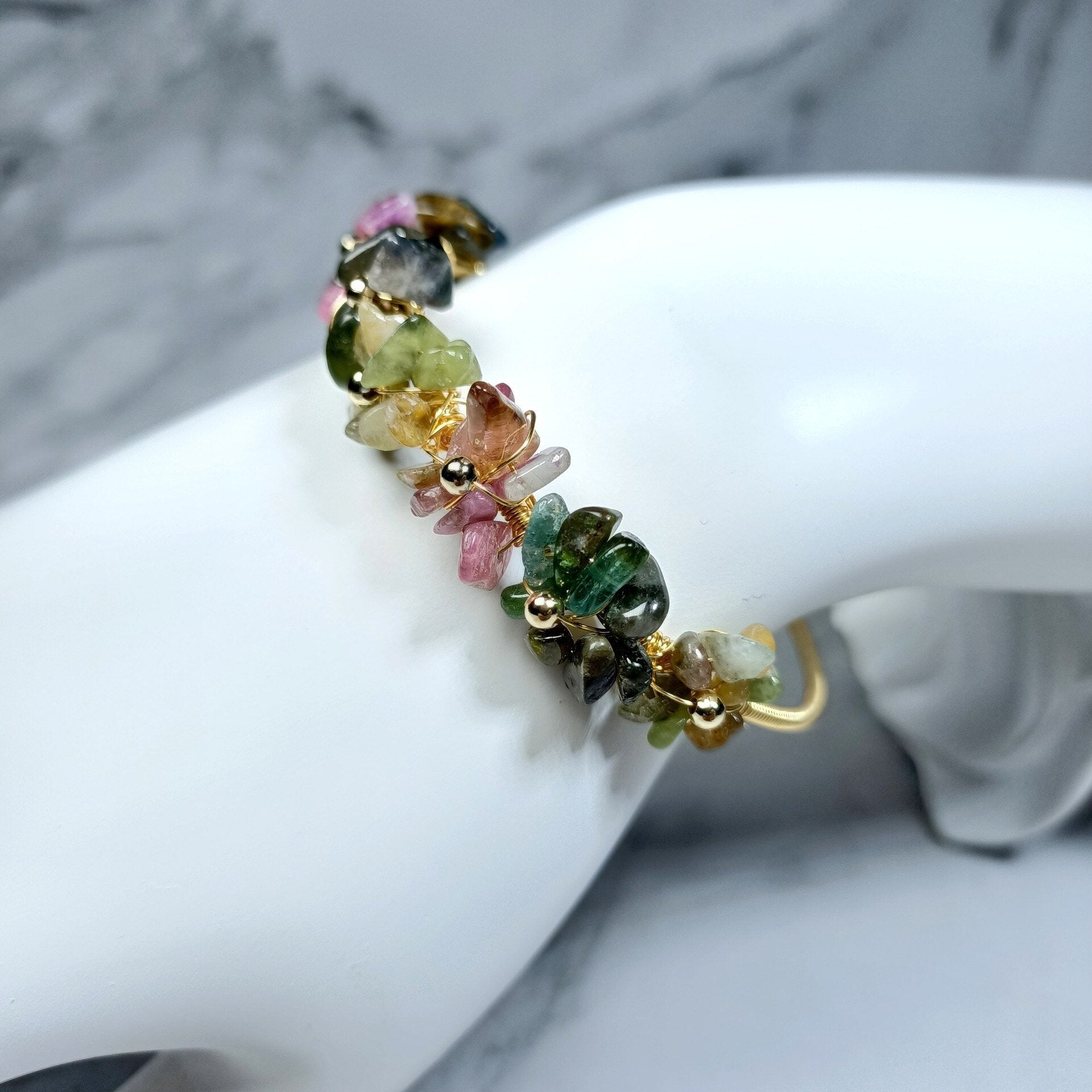 GOUDEN ARMBAND MET PARELS EN TOERMALIJN