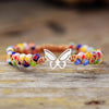 VIBRANT ENERGIES VLINDER MACRAME ARMBAND